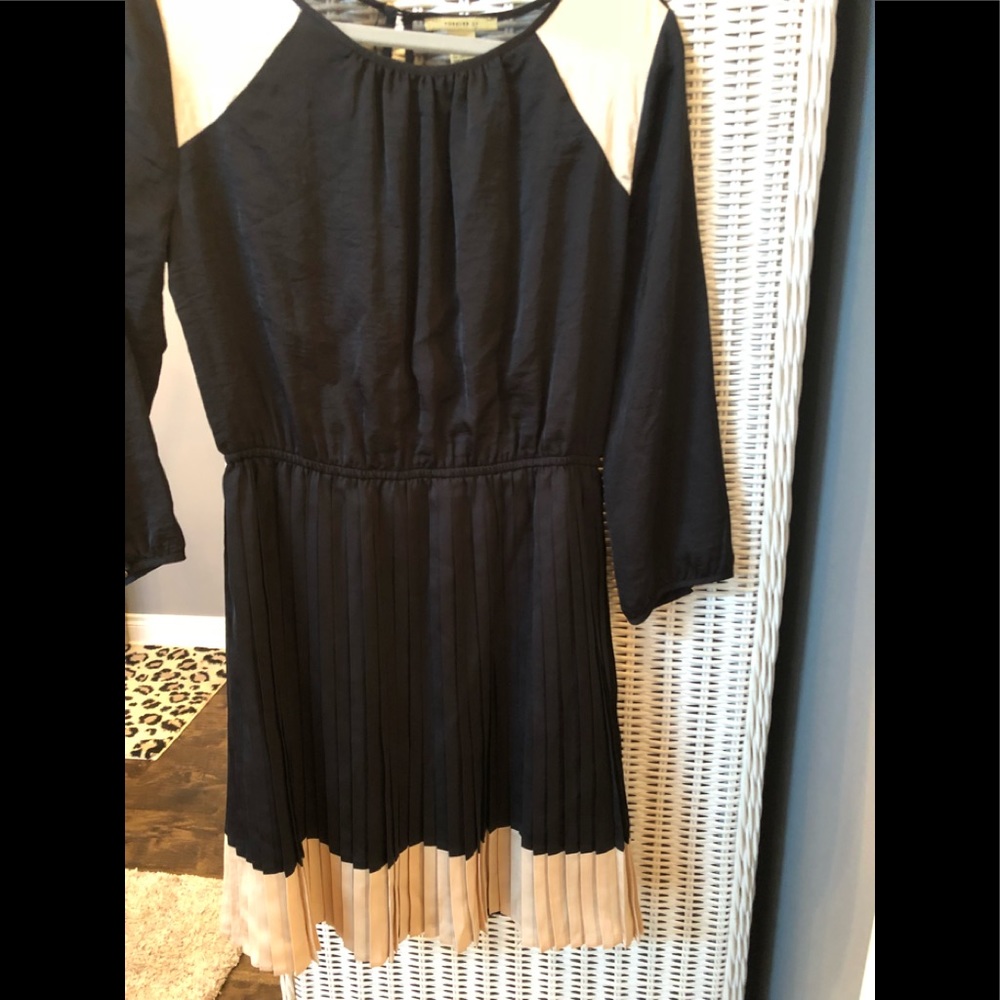 Black and cream pleated dress